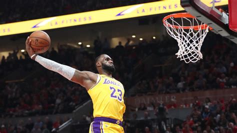 Sometimes you just can't contain yourself watching lebron james dunk the basketball. NBA highlights: LeBron James begins Lakers career with ...