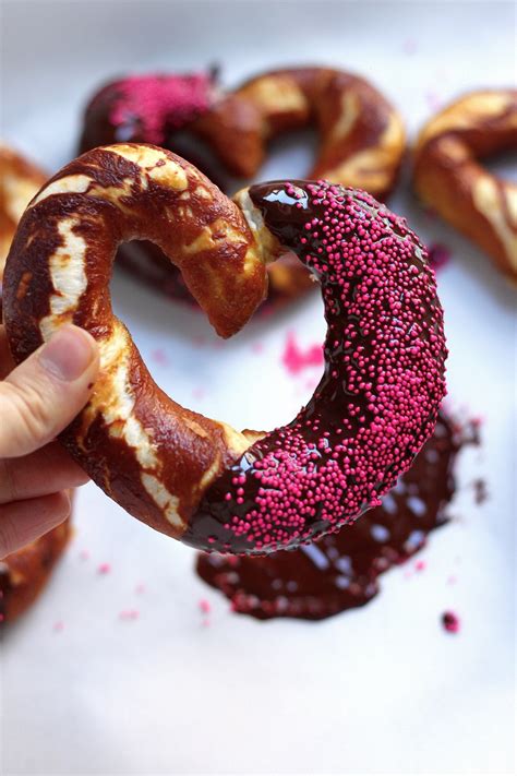 Quick and easy 1 hour soft pretzel dough stuffed with chocolate ganache and coated in cinnamon sugar. Heart Shaped Chocolate Dipped Soft Pretzels - Baker by Nature