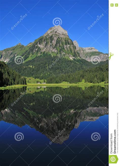 Mt Brunnelistock Mirroring In Lake Obersee Stock Photo Image Of