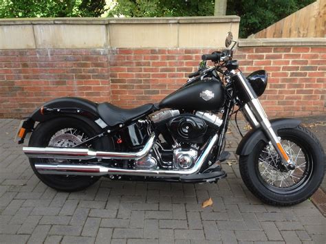 00:53 2013 fls softail® slim™ 034737 vin:1hd1jrv1xdb034737 color:ember red sunglo base price:$16,099.00 freight:$390.00 tax, tag, title, fees:price does not include dealer prep, processing, taxes and applicable fees. 2013 HARLEY-DAVIDSON SOFTAIL SLIM FLS 103 13 BLACK