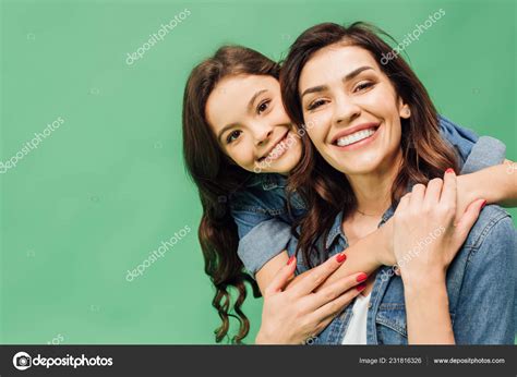 Portrait Cheerful Mother Daughter Embracing Looking Camera Isolated