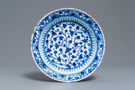 A Blue And Wite Iznik Dish With Floral Design Turkey Late Th C
