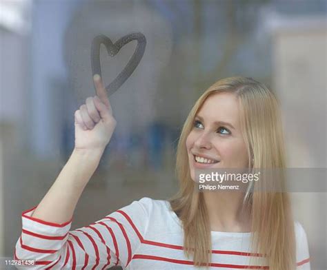 Woman Drawing Heart Photos And Premium High Res Pictures Getty Images