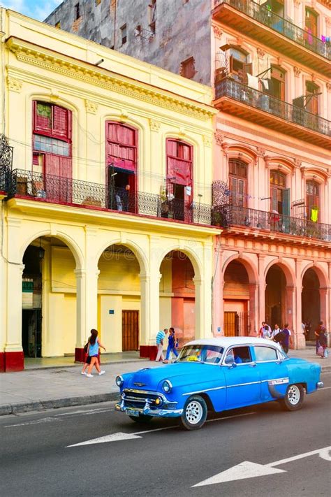 Classic Old Cars And Colorful Buildings In Downtown Havana Editorial