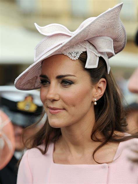 In official pictures to mark the couple's anniversary, kate is seen wearing a brand new. KATE MIDDLETON Attends at Buckingham Palace Garden Party ...