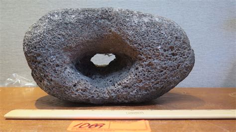 Lava Rock With Hole In The Middle Possibly Used As Anchor
