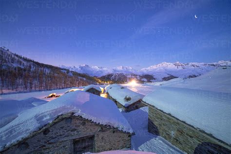 Groppera Stone Huts Covered With Snow During A Starry Night Madesimo