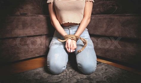 Hands Of A Victim Woman Tied With Rope Stock Image Colourbox