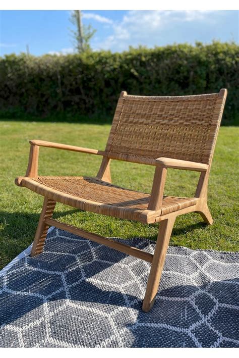 Teak Garden Arm Chair Made With Rattan Perfect For Relaxation Outdoors