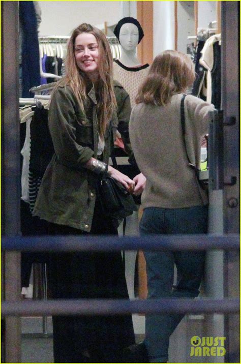 Amber Heard And Future Stepdaughter Lily Rose Depp Laugh And Bond While