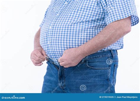 Overweight Man Trying To Fasten Too Small Clothes Isolated On White