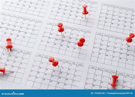 A Lot Of Red Pins Marking On Calendar Stock Image Image Of Close