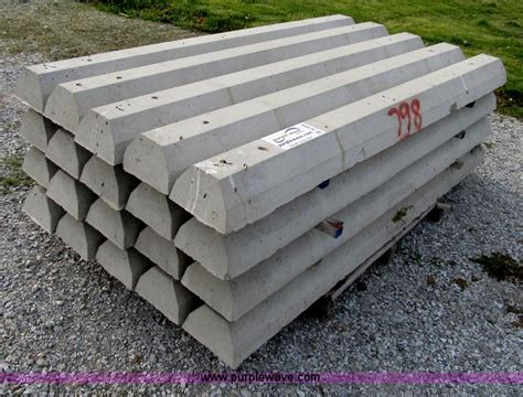(20) concrete parking stops in Troy, MO | Item B2696 sold | Purple Wave