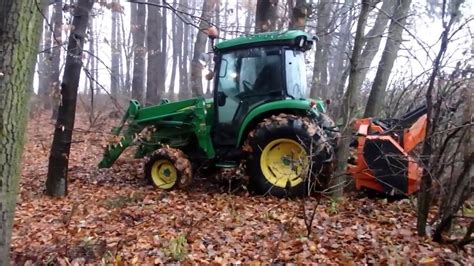 John Deere 4066r With Mulcher Mulching Small Trees Youtube