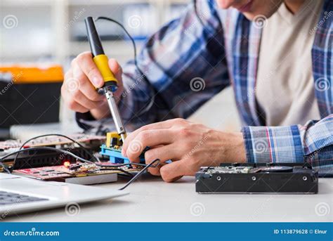 Computer Hardware Repair And Fixing Concept By Experienced Techn Stock