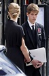 Queen's youngest grandchild James Viscount Severn, 14, is comforted by ...