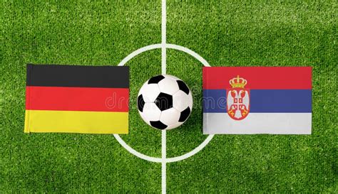 Top View Soccer Ball with Germany Vs. Serbia Flags Match on Green
