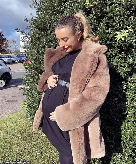 Pregnant Dani Dyer Shows Off Her Blossoming Baby Bump In Black Dress