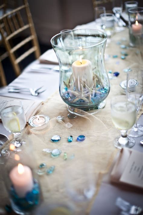 Elegant beach wedding ideas in an unconventional but beautiful colour palette of rich marsala and pewter. Simply elegant beach themed centerpieces | Beach wedding ...