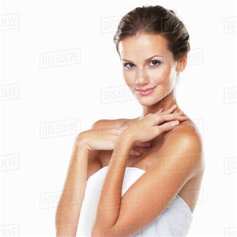 Studio Portrait Of Beautiful Woman Wrapped In Towel Stock Photo