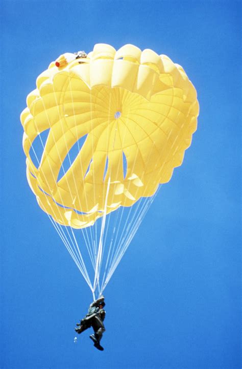 A Us Navy Test Parachutist Makes A Descent With A New Canopy Type