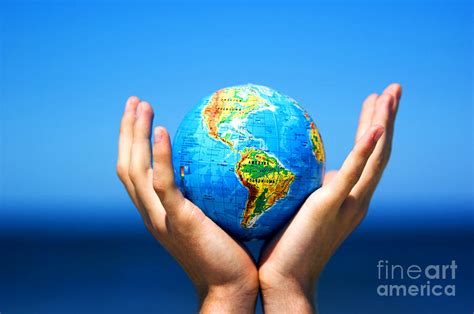 Earth Globe In Hands Conceptual Image Photograph By Michal Bednarek