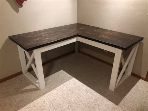 Make a counter height craft table from 2 shelves, a table top and 8 legs. Modified L Shaped Desk | Ana White | Diy wooden desk, Diy ...