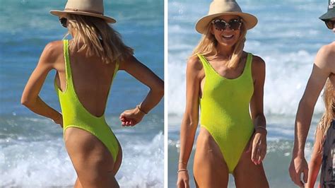 Carrie Bickmore Hits Beach In Byron Bay In Eye Catching Neon Swimsuit