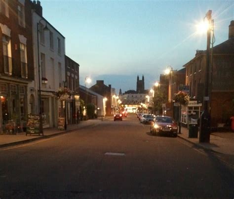 Bare bones churros and pizza. Clemens Street, Old Town in Leamington spa, at dusk. I ...