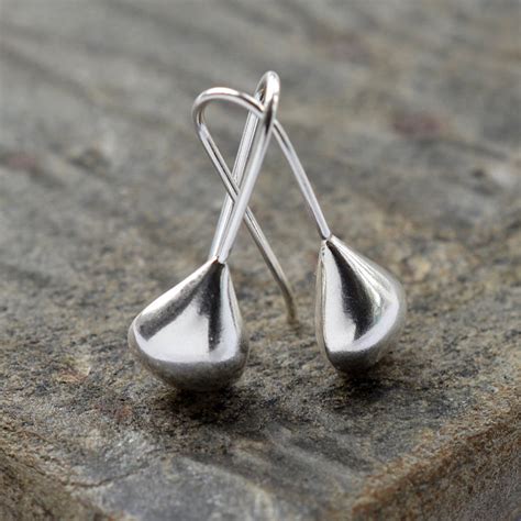 The sterling silver earrings add a trendy touch of sophistication to the body for both men and women. Sterling Silver Teardrop Earrings By Martha Jackson ...
