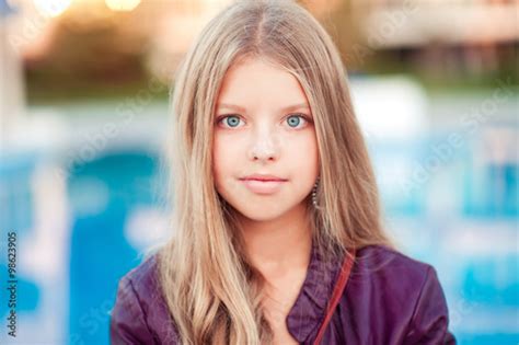 Beautiful Blonde Teenage Girl Year Old Posing Outdoors Over Blue