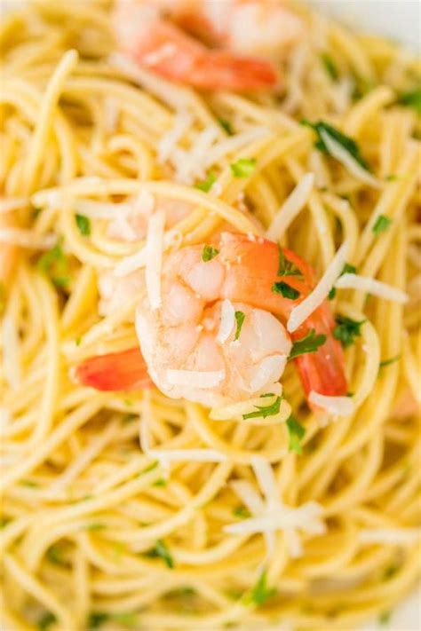 A creamy white wine sauce, al dente fettuccine noodles, parmesan cheese, and simple sautéed shrimp make a its light yet so satisfying. Classic Shrimp Scampi Pasta • Food, Folks and Fun