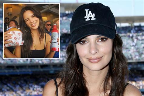 Emily Ratajkowski Flashes Her Cleavage As She Tucks Into A Burger And A