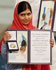 Malala vows to fight on as she shares Nobel Peace Prize
