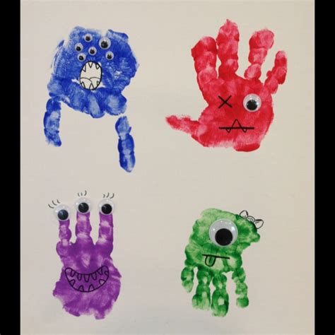 Four Handprints With Different Colored Hands And Eyes On Them All