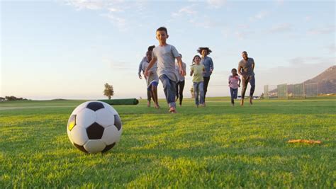 Kids Playing American Football Image Free Stock Photo