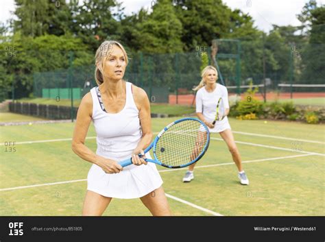 Mature Women During A Tennis Match On Grass Court Stock Photo Offset