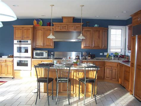 Decorating with oak cabinets kitchen cabinets decor. Trust Your Gut or Ask the Expert? | Blue kitchen walls ...