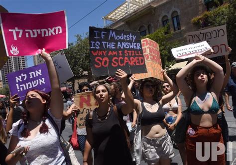 Photo Israeli Carry Signs In The SlutWalk Protest In Jerusalem