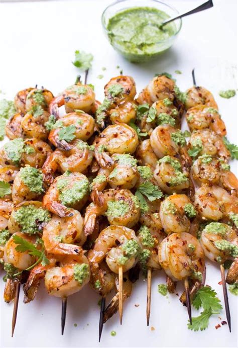 Whether you skewer them on the grill or sear them for ceviche, your shrimp will come alive with these 45 sides for shrimp. Garlic Shrimp Skewers with Cilantro Pesto - Little Broken