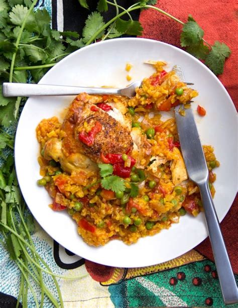 This mexican version of arroz con pollo includes large cubes of chicken and spicy green chilies. Arroz Con Pollo: Spanish Chicken and Rice Casserole ...