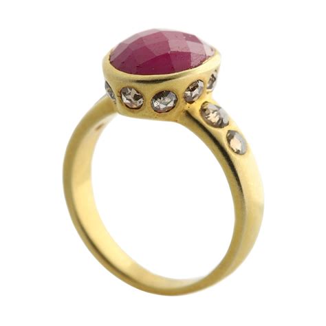 18k yellow gold oval red ruby w a halo of baguette cut diamonds ballerina ring for sale at 1stdibs