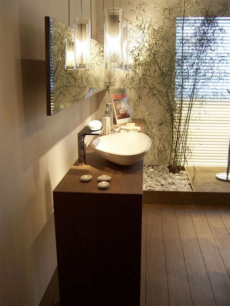 Amazing Zen Bathroom With Bamboo Plants And Vessel Sink Also Pendants