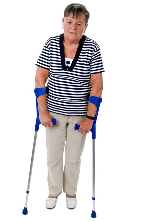 Old Woman Walking On Crutches Stock Photo Image Of Mature Female