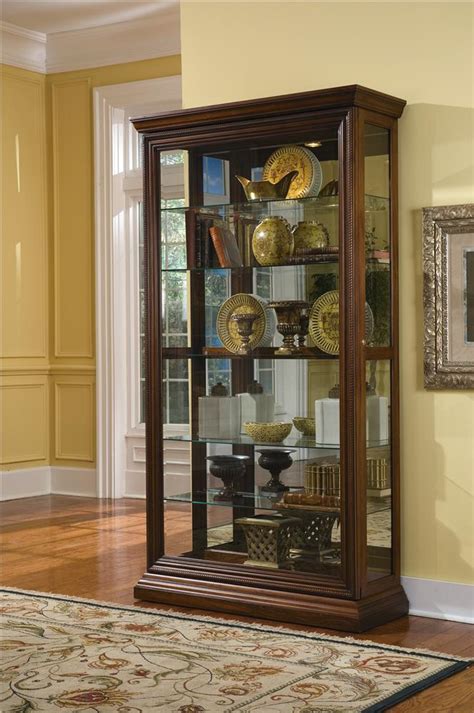 The curio is solidly built in select hardwood solids and veneers with a dark and dramatic chocolate cherry ii finish. Pulaski Furniture Curios 21015 Edwardian Two Way Sliding ...