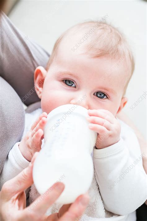 Baby Girl Drinking Milk From A Bottle Stock Image C0353688