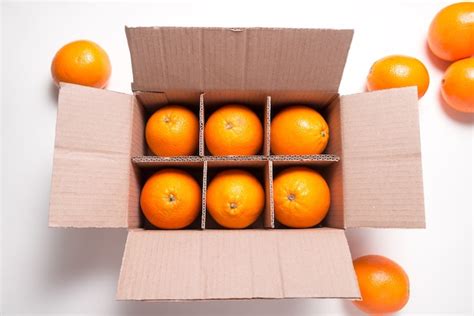 Premium Photo Lot Of Fresh Citrus Orange Fruits In Cardboard Box