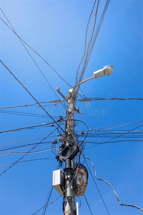 Wires And Equipment On A Street Lighting Pole Bottom View Vertical