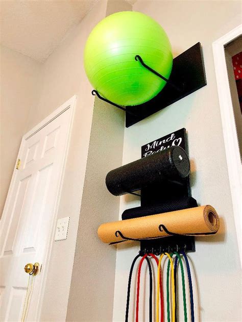 Make sure it's not more economical in your area to simply rent an apartment with an extra bedroom to hold your home. diy exercise ball storage + diy yoga mat storage #home gym ...
