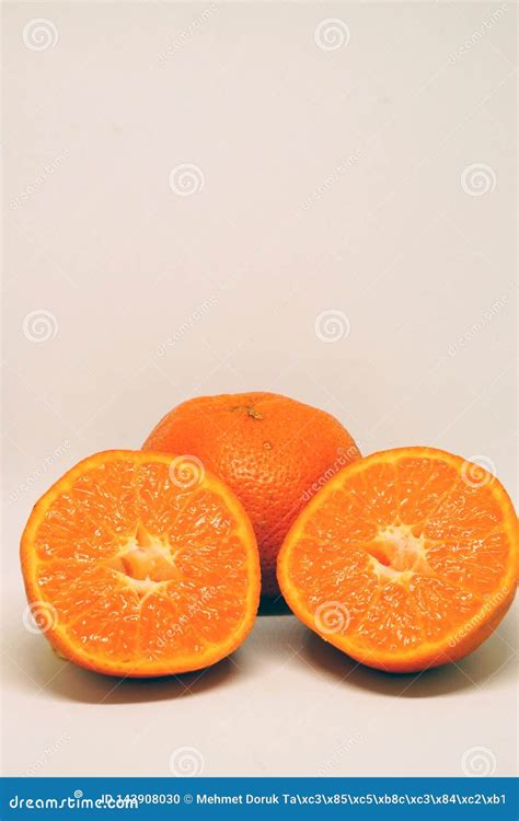 Peeled Orange And Mandarin Slices On White Isolated Background Stock